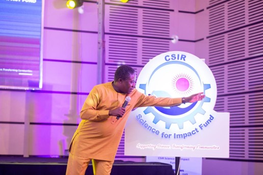 Prof. Paul Bosu explaining the elements of the CSIF logo to guests